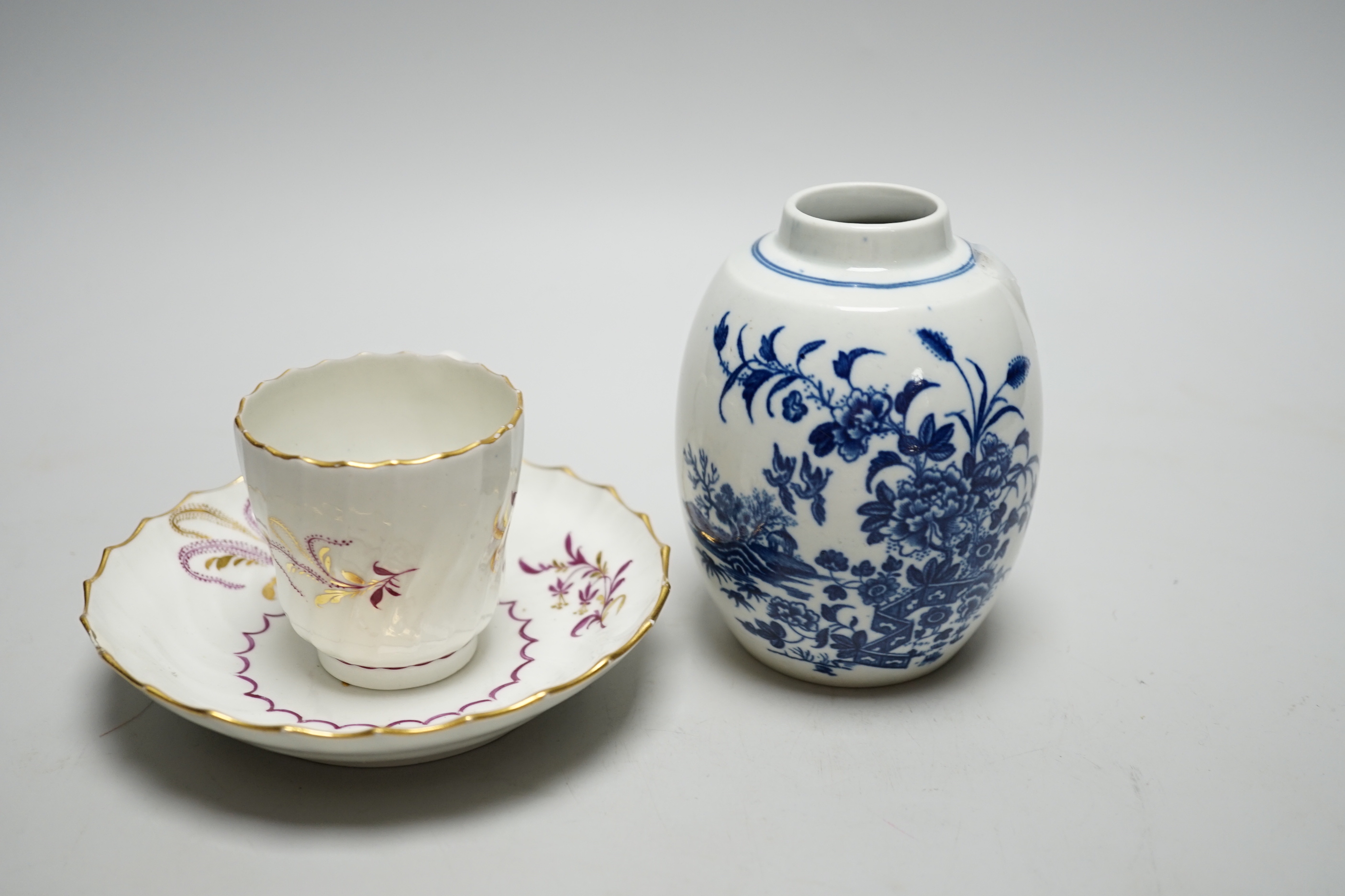 A Worcester Fence pattern tea canister, c.1775, and a Worcester wrythen coffee cup and saucer, c.1795